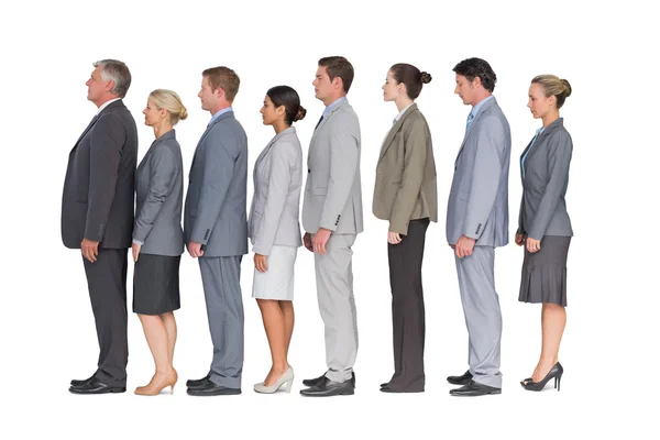 Business team standing in row Stock Photo