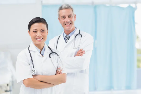 Confident male and female doctors — Stock Photo, Image