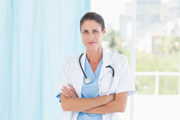 Portrait of a smiling confident female doctor Royalty Free Stock Images
