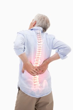 Highlighted spine of man with back pain clipart