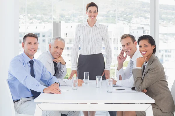 Business team smiling at camera — Stock Photo, Image