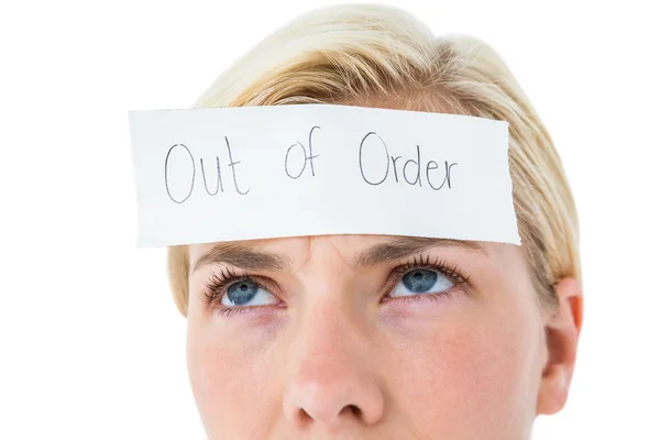 Anxious woman with sign on her forehead — Stock Photo, Image