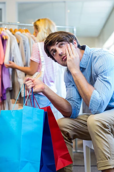 Happy blonde woman doing shopping — Stock Photo, Image