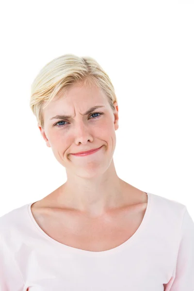 Confused woman looking at camera — Stock Photo, Image