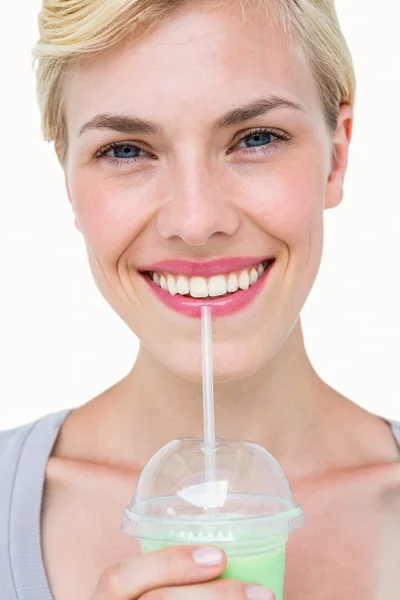 Blonde woman holding healthy juice — Stock Fotó