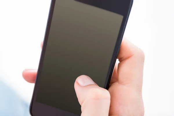 Woman using her mobile phone — Stock Photo, Image