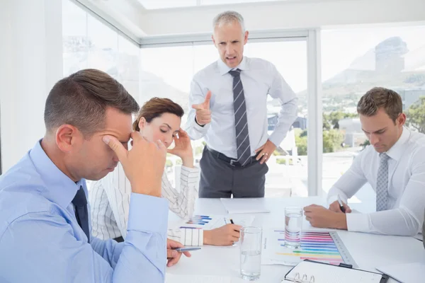 Businessman yelling at his team Royalty Free Stock Images