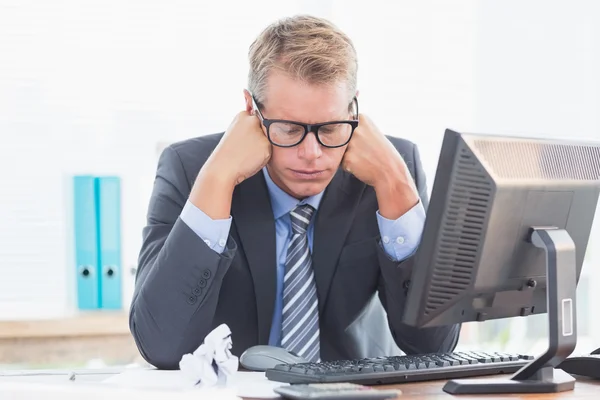 Businessman being depressed by accounting — Stockfoto