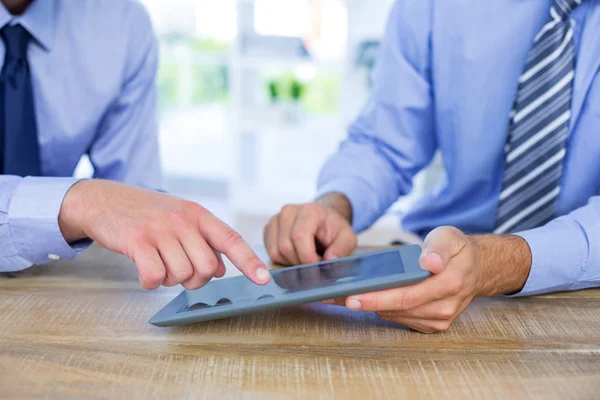 Businessmen using tablet — Stock Photo, Image