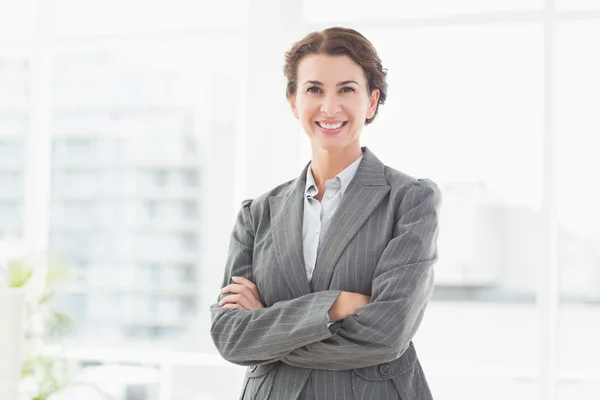 Smiling businesswoman looking at camera — Stock Photo, Image