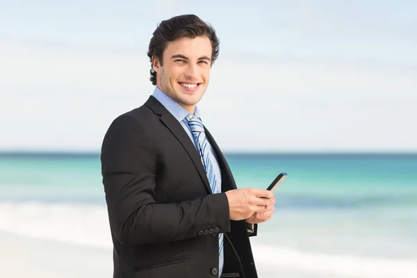 Businessman using his smartphone — Stock Photo, Image