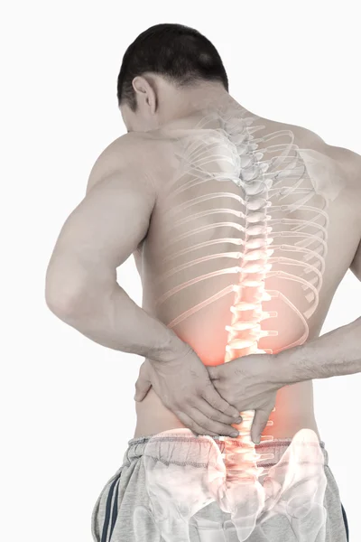 強調表示された背骨の背中の痛みを持つ男 — ストック写真