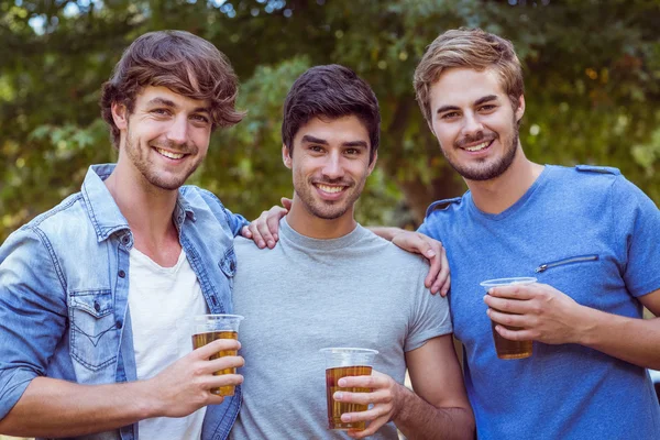 Happy friends in the park — Stock Photo, Image