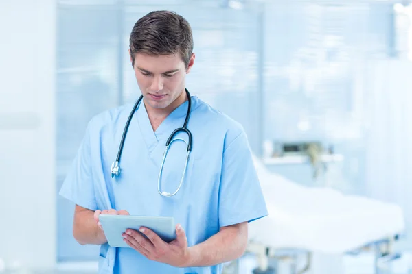 Doctor holding tablet — Stock Photo, Image