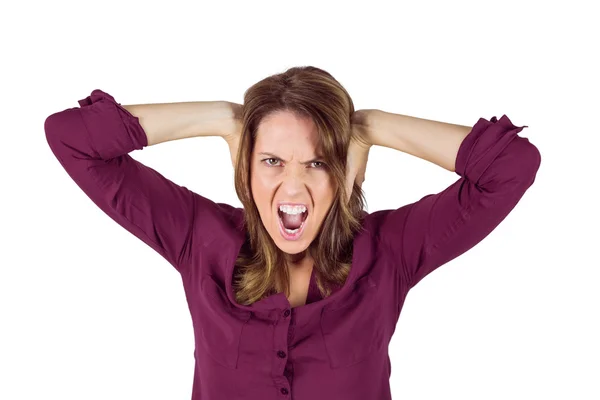 Pretty brunette shouting with hands on head — Stock Photo, Image