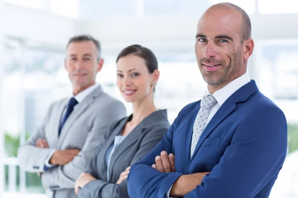 Compañeros de negocios mirando la cámara — Foto de Stock