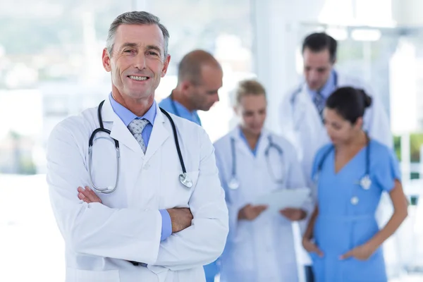 Doctor smiling at camera — Stock Photo, Image