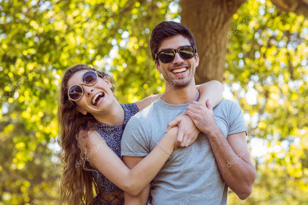 Cute couple in the park - Stock Photo, Image. 