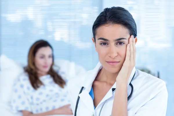Serious doctor looking at camera — Stock Photo, Image
