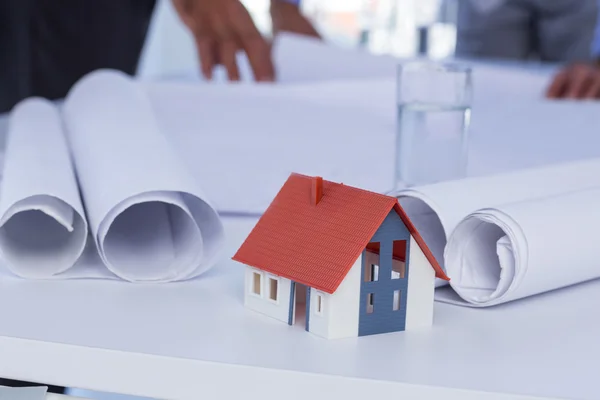 Miniature house in the office — Stock Photo, Image