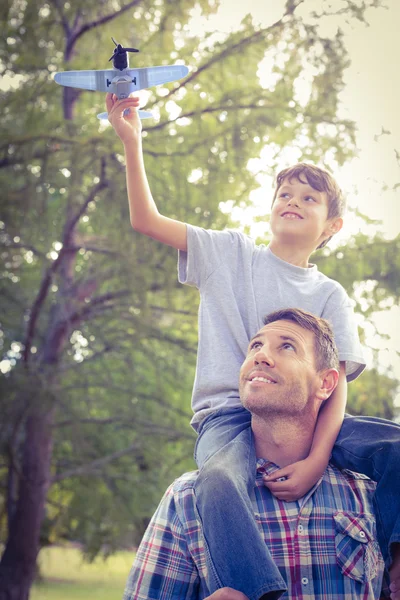 Father and son having fun in the park — Stock Photo, Image