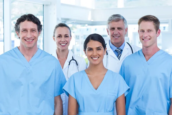 Smiling doctors looking at camera — Stock Photo, Image