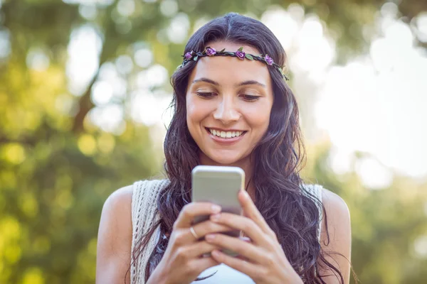 Pretty hipster using her smartphone — Stock Photo, Image