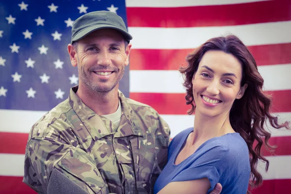 Handsome soldier reunited with partne — Stock Photo, Image