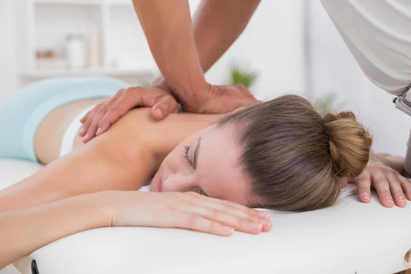 Physiotherapist doing back massage — Stock Photo, Image