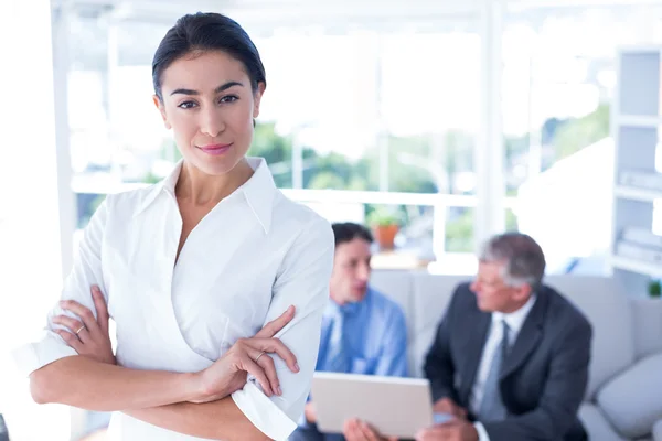 Businesswoman with arms crossed at office — Stock Photo, Image