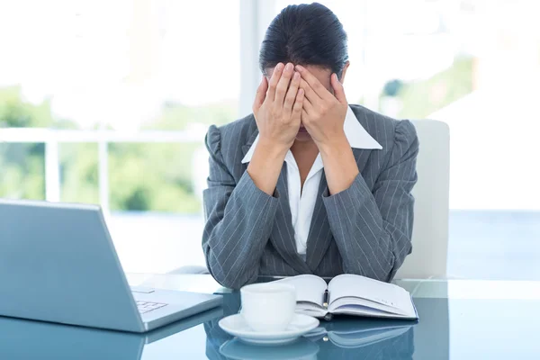 Worried businessman with head in hands — Stock Photo, Image