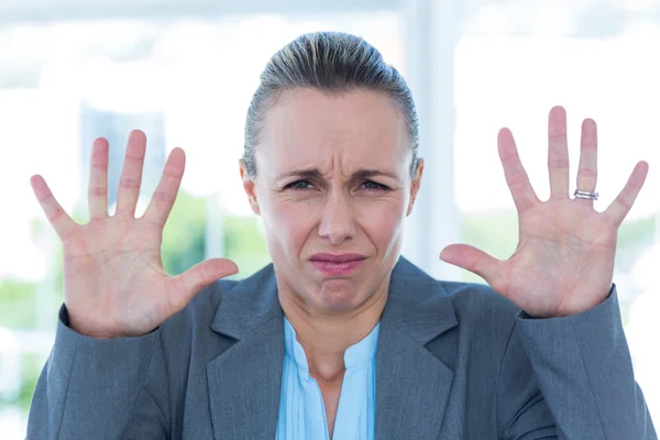 Upset businesswoman showing her hands — Stock Photo, Image