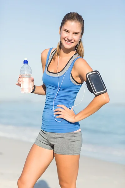 Portrait of beautiful fit woman looking at camera — Stok fotoğraf