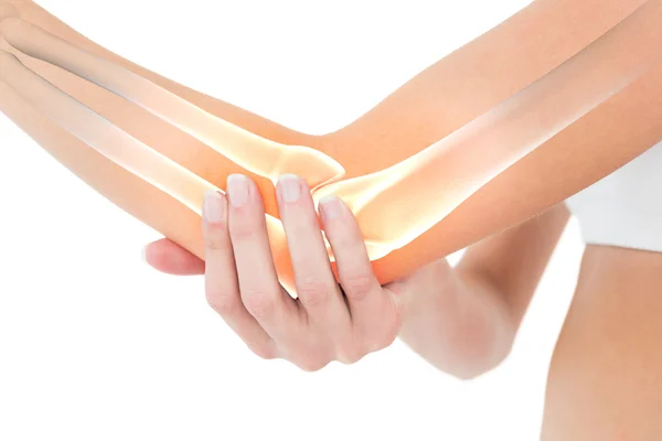 Markerade ben av kvinna med armbågen smärta — Stockfoto