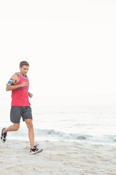 Handsome fit man running — Stock Photo, Image