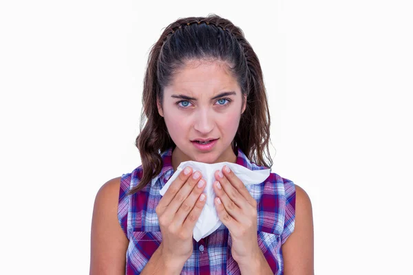 Pretty brunette woman blowing her nose — Stock Photo, Image