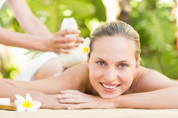 Attractive woman getting massage on her back — Stok fotoğraf