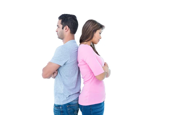 Angry couple standing back to back — Stock Photo, Image