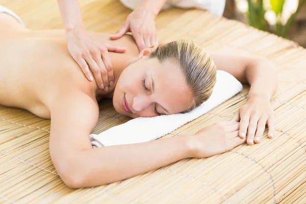 Attractive woman getting massage on her back — Stock Photo, Image