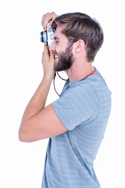 Happy handsome man taking pictures — Stock Photo, Image