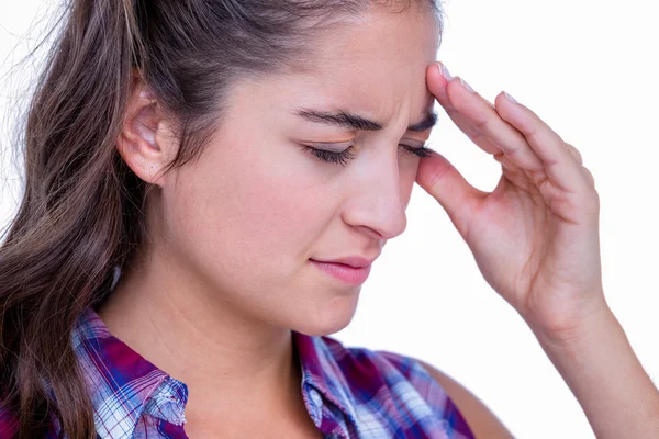 Una guapa morena con dolor de cabeza — Foto de Stock