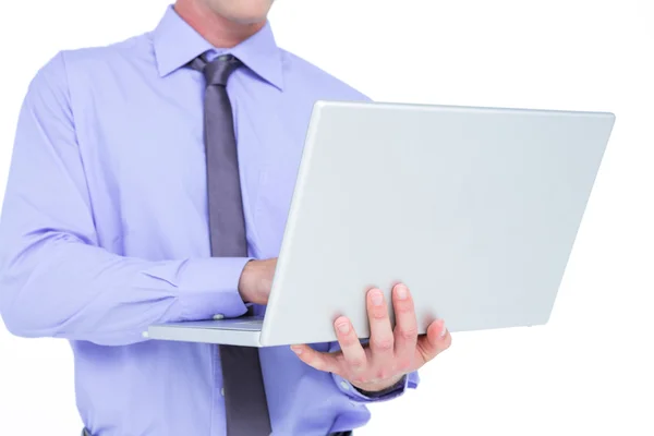 Zakenman met een laptop — Stockfoto