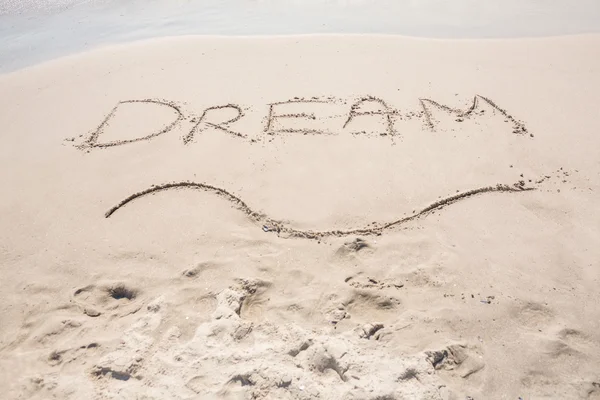 Inscription dream on sand — Stock Photo, Image