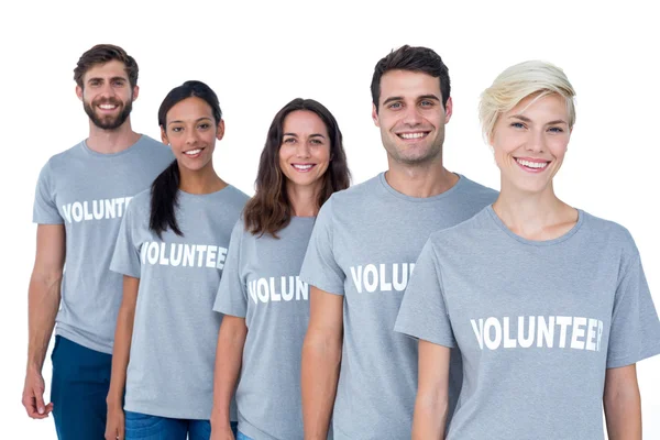 Happy volunteers friends smiling to the camera — Stock Photo, Image