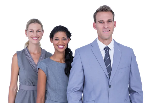 Feliz equipo de negocios sonriendo a la cámara — Foto de Stock