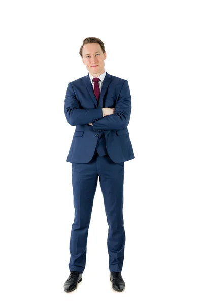 Happy businessman looking at camera with arms crossed — Stock Photo, Image