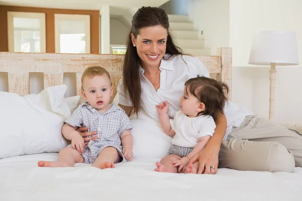 Mother with cute babies — Stock Photo, Image
