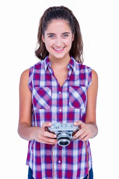 Pretty brunette holding photo camera — Stock Photo, Image