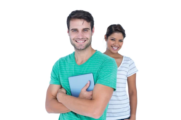 Felices amigos sonriendo a la cámara — Foto de Stock