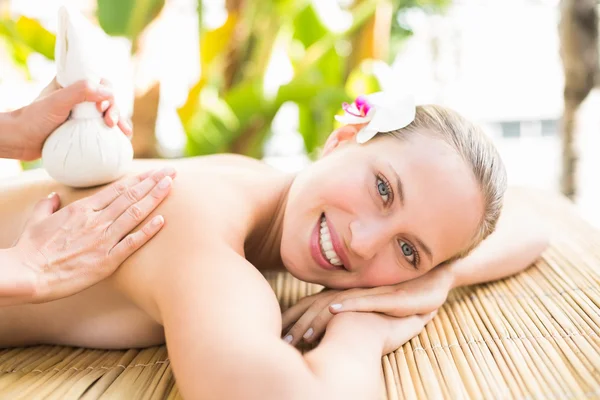 Woman getting massage on her back — Stock fotografie